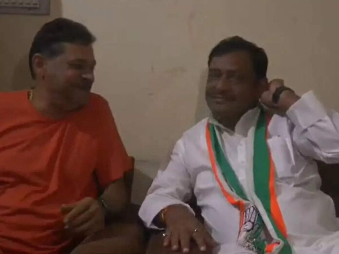Kirti Jha Aazad with Akhilesh Singh