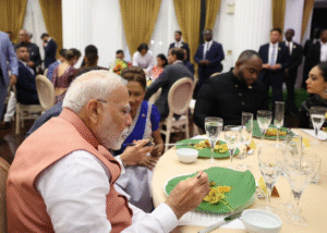 PM Modi eating food on Trinidad Sohari leaf