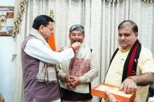 CM Dhami Meets Dinesh Arya